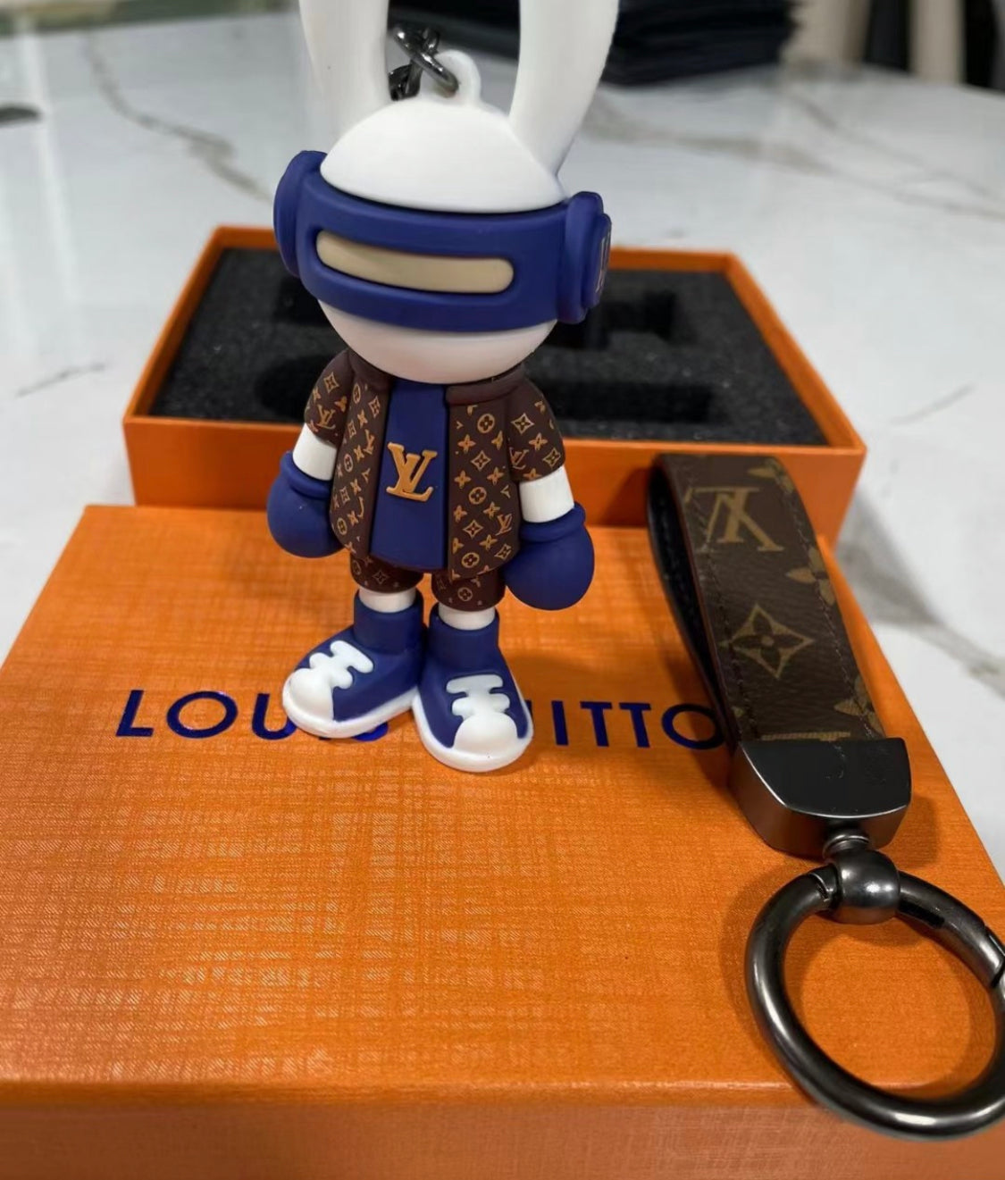 Keychain tal-pupazzi lussużi