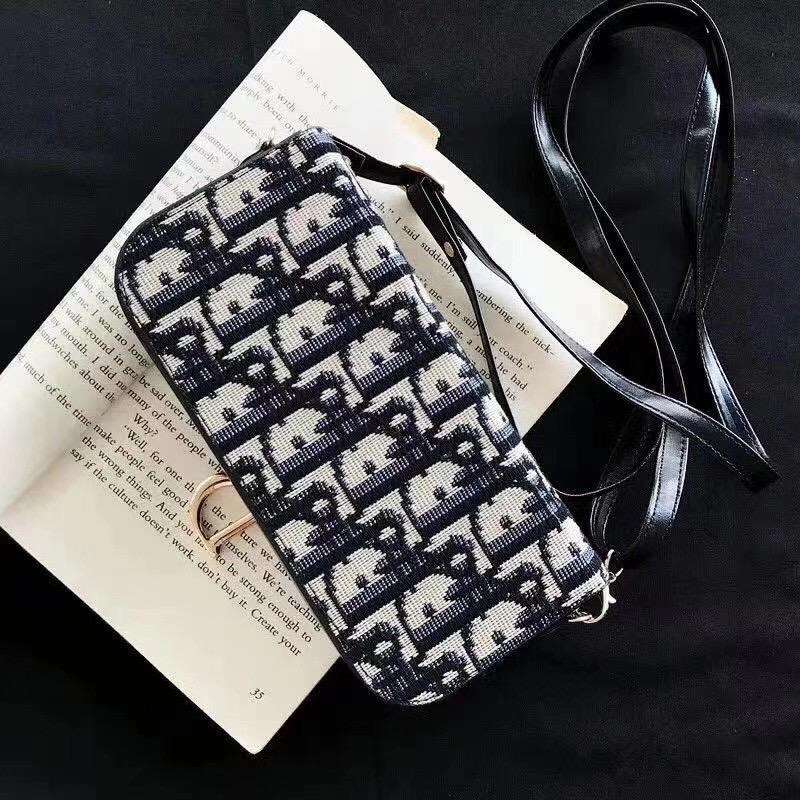 Schwarze Blumen -Telefontasche